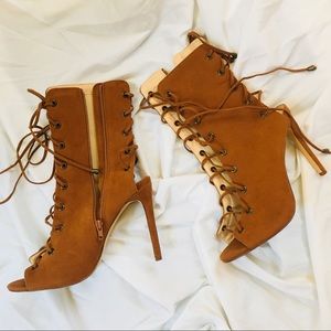 Heeled lace up boots padded interior and sole